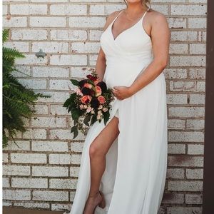 Worn once as a Bridesmaid dress. Size A14. Ivory.